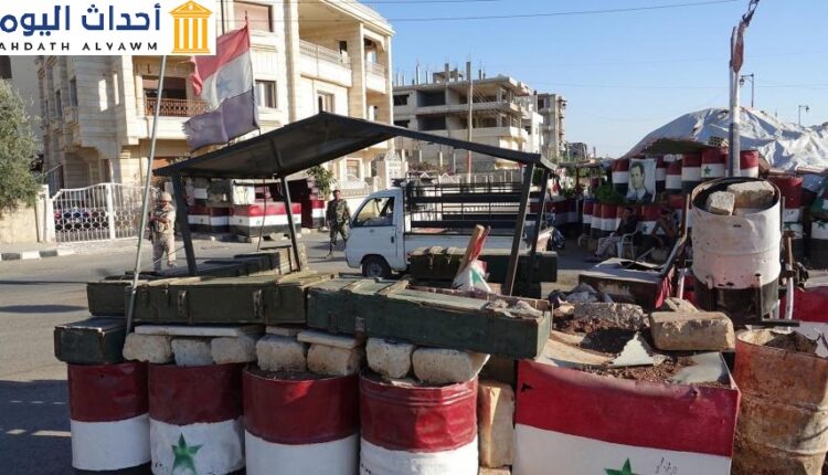 نقطة تفتيش في مدينة درعا السورية