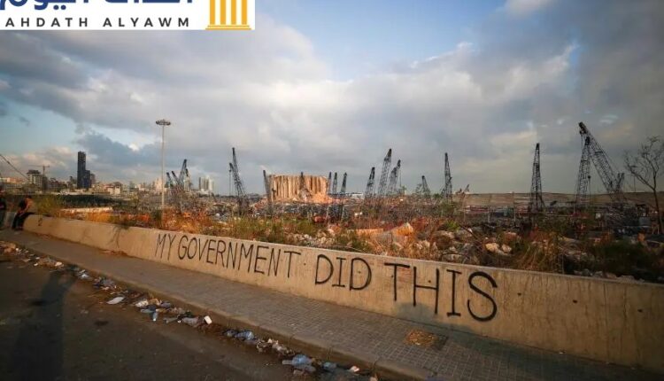 كتابة على حائط في منطقة المرفأ المتضررة بعد انفجار هائل في بيروت، لبنان، 11 أغسطس/آب 2020