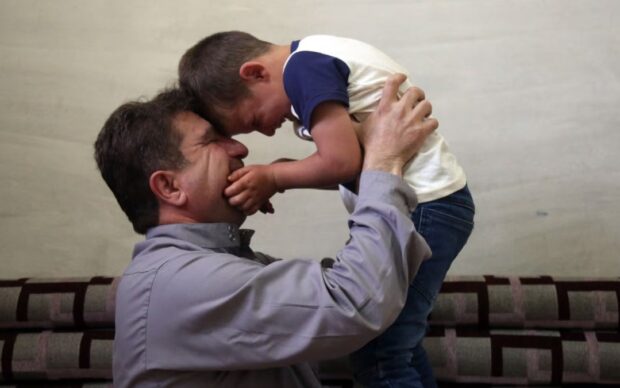 202212drd syria dad child autism.jpg
